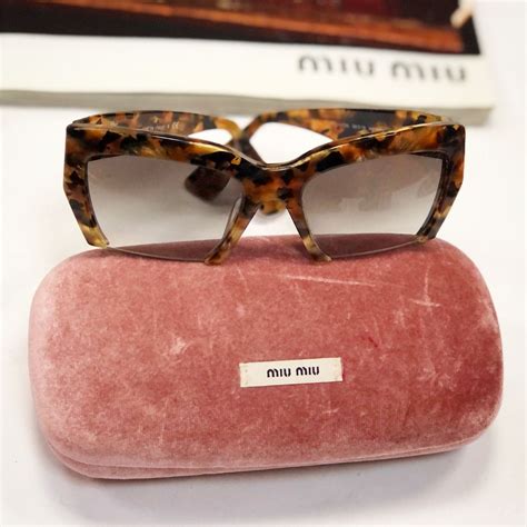 Очки Miu Miu .